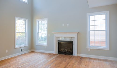 Interior new house construction fireplace in light room new apartment